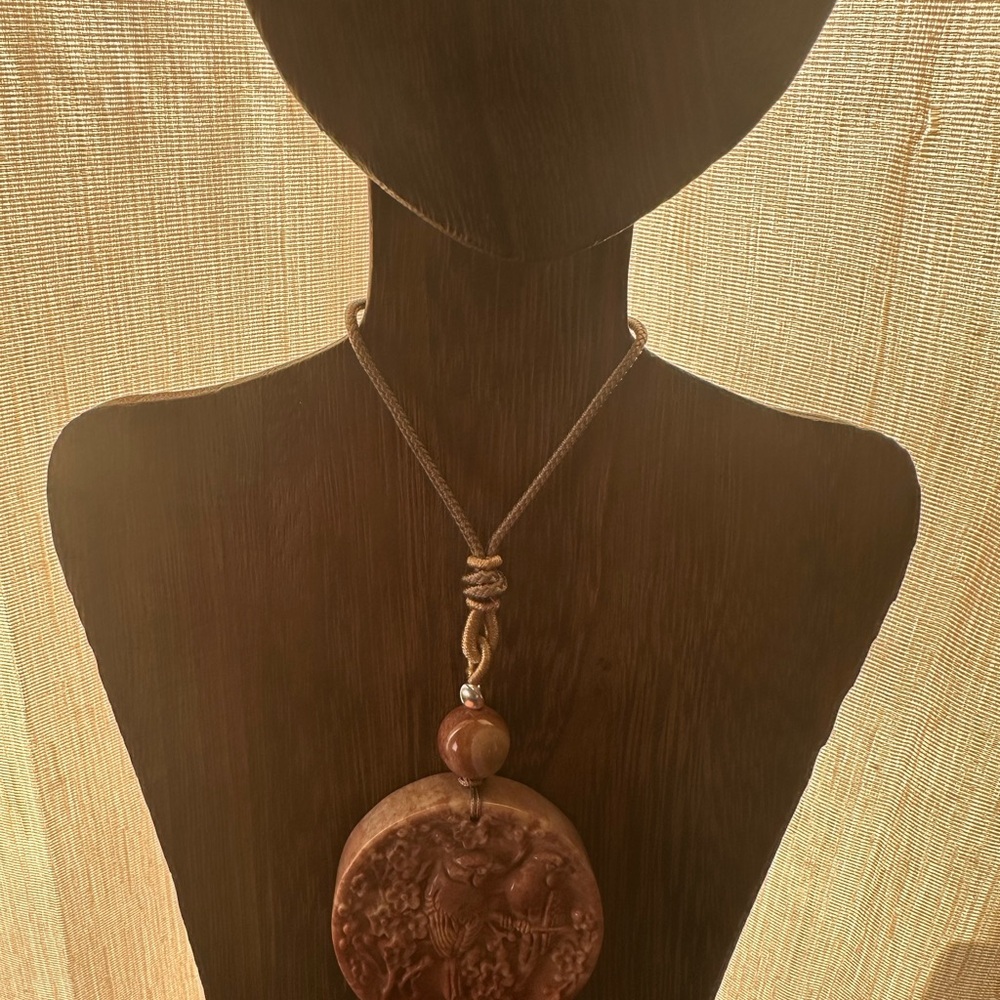 Coral Fossil Carved Round Bird Pendant Necklace on Tan Adjustable Rope - Picture 4 of 13